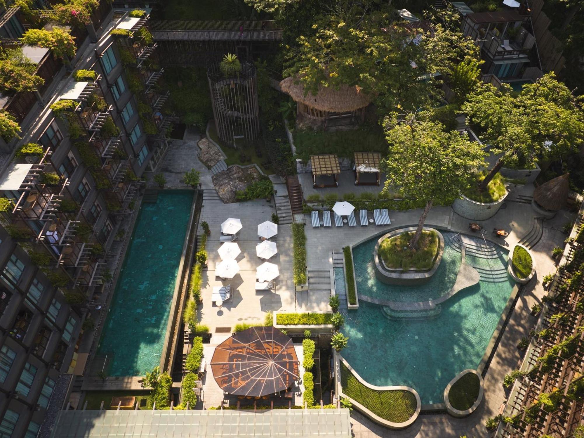 Dinso Resort & Villas Phuket, Vignette Collection By Ihg Patong Екстер'єр фото The swimming pool at the hotel